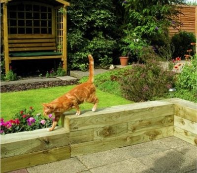 Grange Fencing Railway Sleeper Timber sleepers used as edging surrounding patio paving