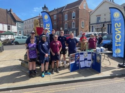 Ryan Farrow of our Turnbull Brigg Branch posing with other participants of his charity walk