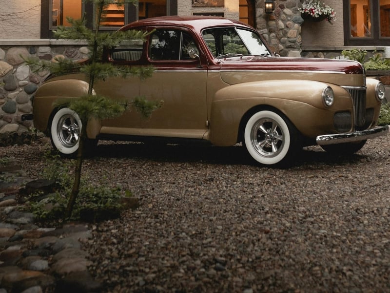 Vintage car on gravel drive