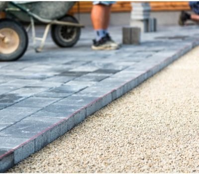 Paving blocks on sharp sand base