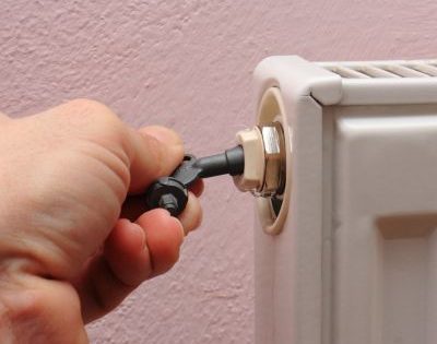 Bleeding a radiator with a radiator bleed key