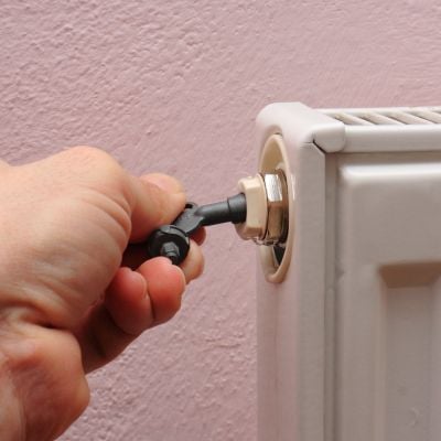 Bleeding a radiator with a radiator bleed key