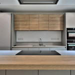 Effortlessly modern: matt grey and wood handleless cabinets