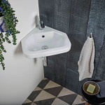 Corner sinks are a great idea for small bathrooms