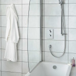 Get the best of both worlds with an over bath shower unit to save space in a small bathroom