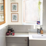 Small Grey Bathroom with large mirror
