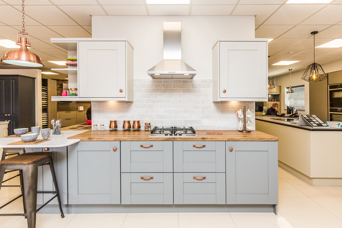 Grey kitchen - shaker kitchen in two tone colours and statement copper fixtures