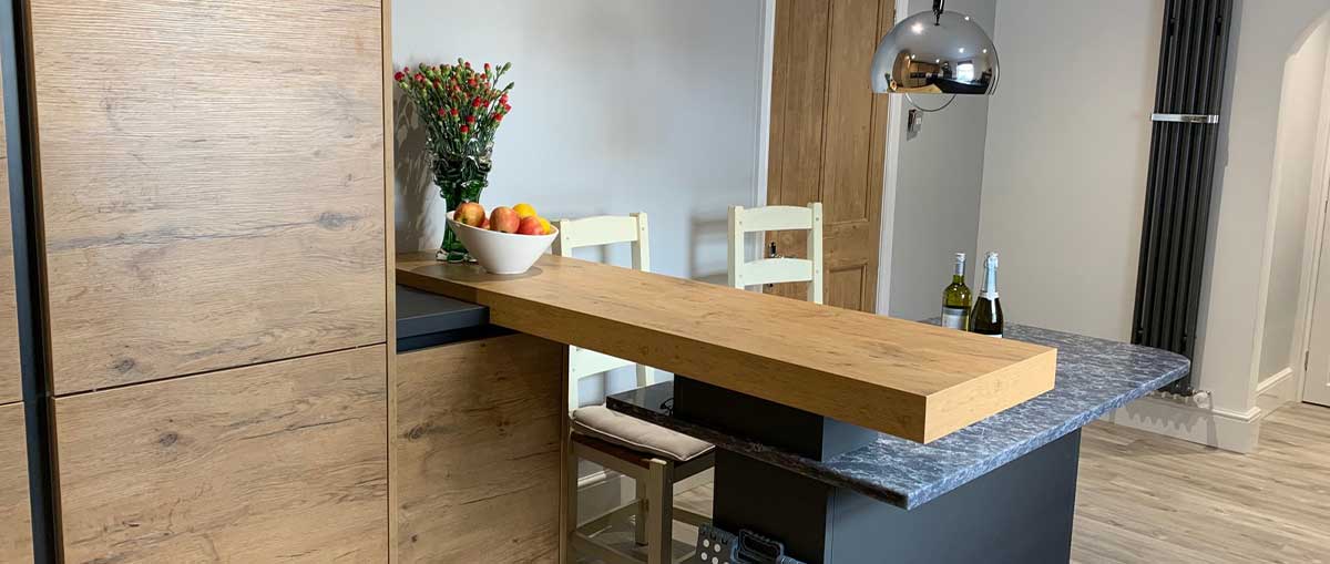 Rotpunkt German kitchen integrated bar and dining table
