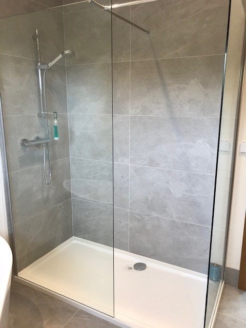 large shower enclosure in small modern bathroom