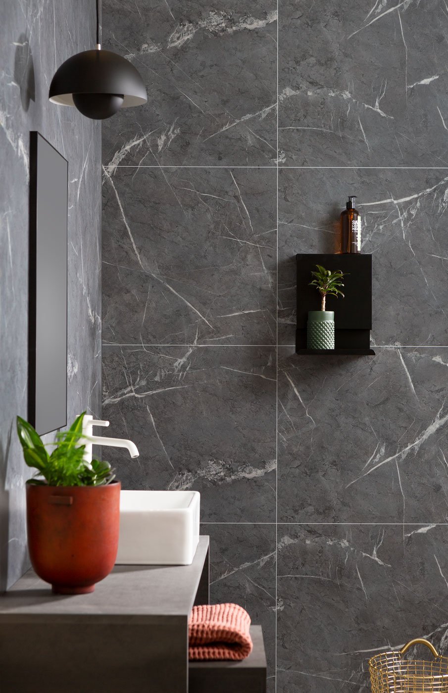 Bathroom Ideas - Dark colour tiles are a statement