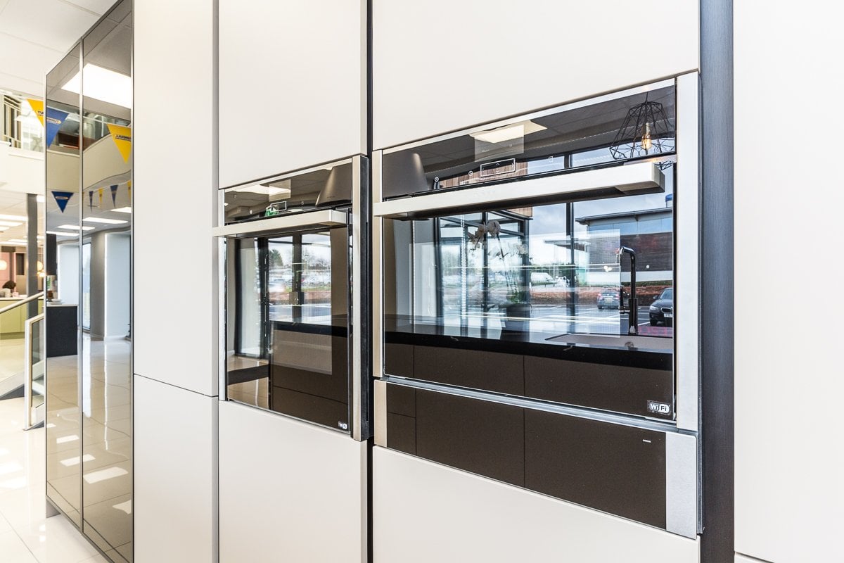 Grey kitchen cabinets with double NEFF oven