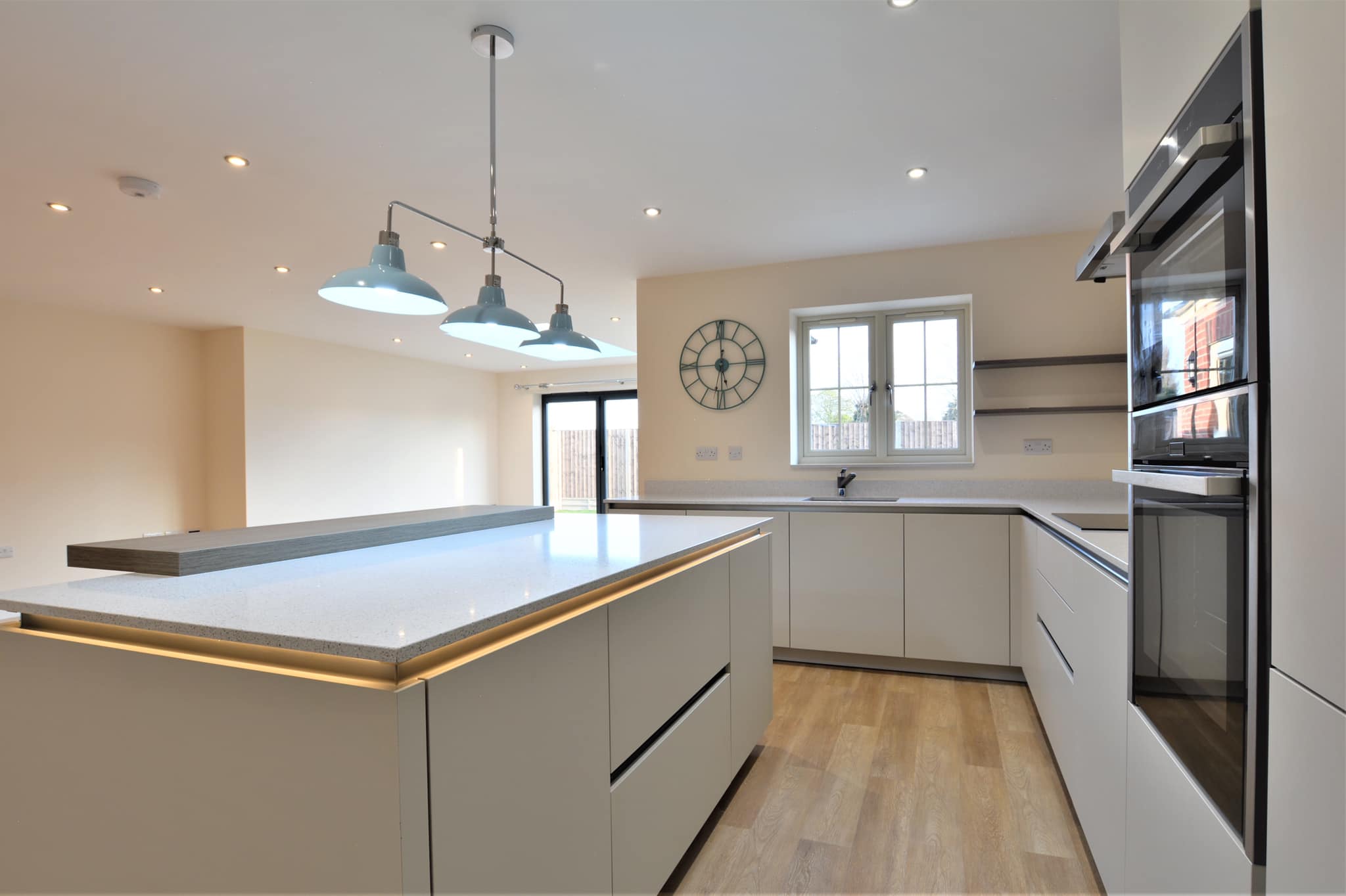 Light Grey kitchen with handleless cabinets