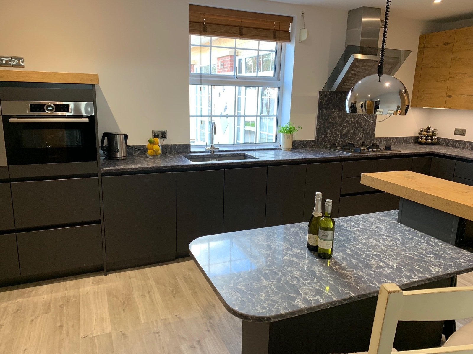 Blanco undermount sink in Rotpunkt German kitchen