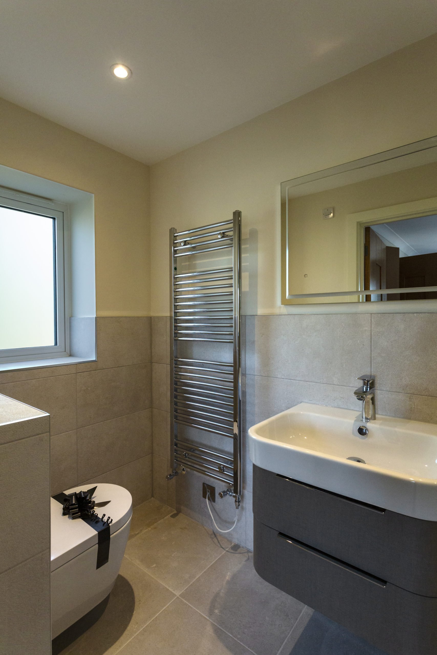 Contemporary bathroom with Zehnder tower rail