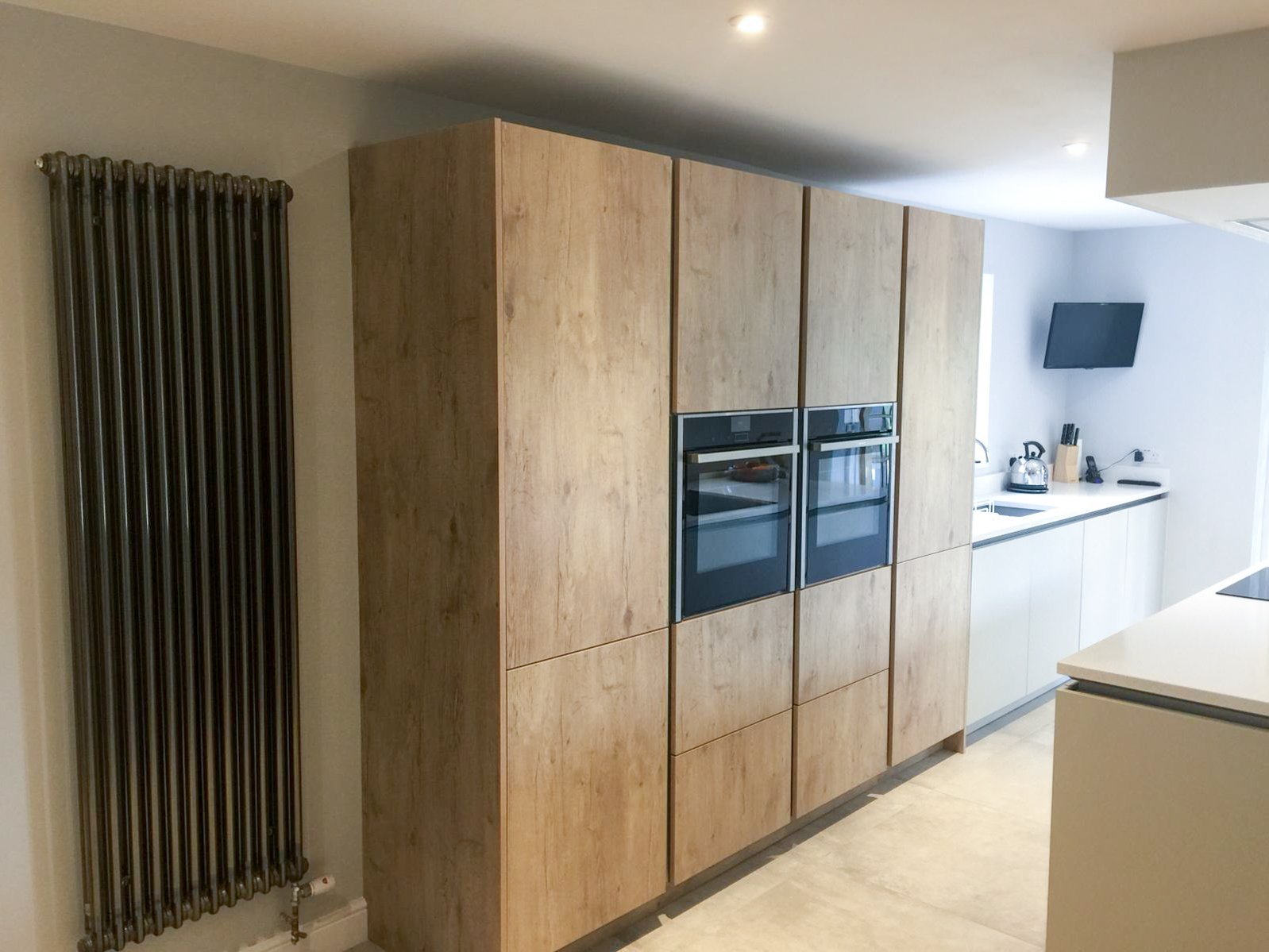 Full wall radiator in german kitchen design