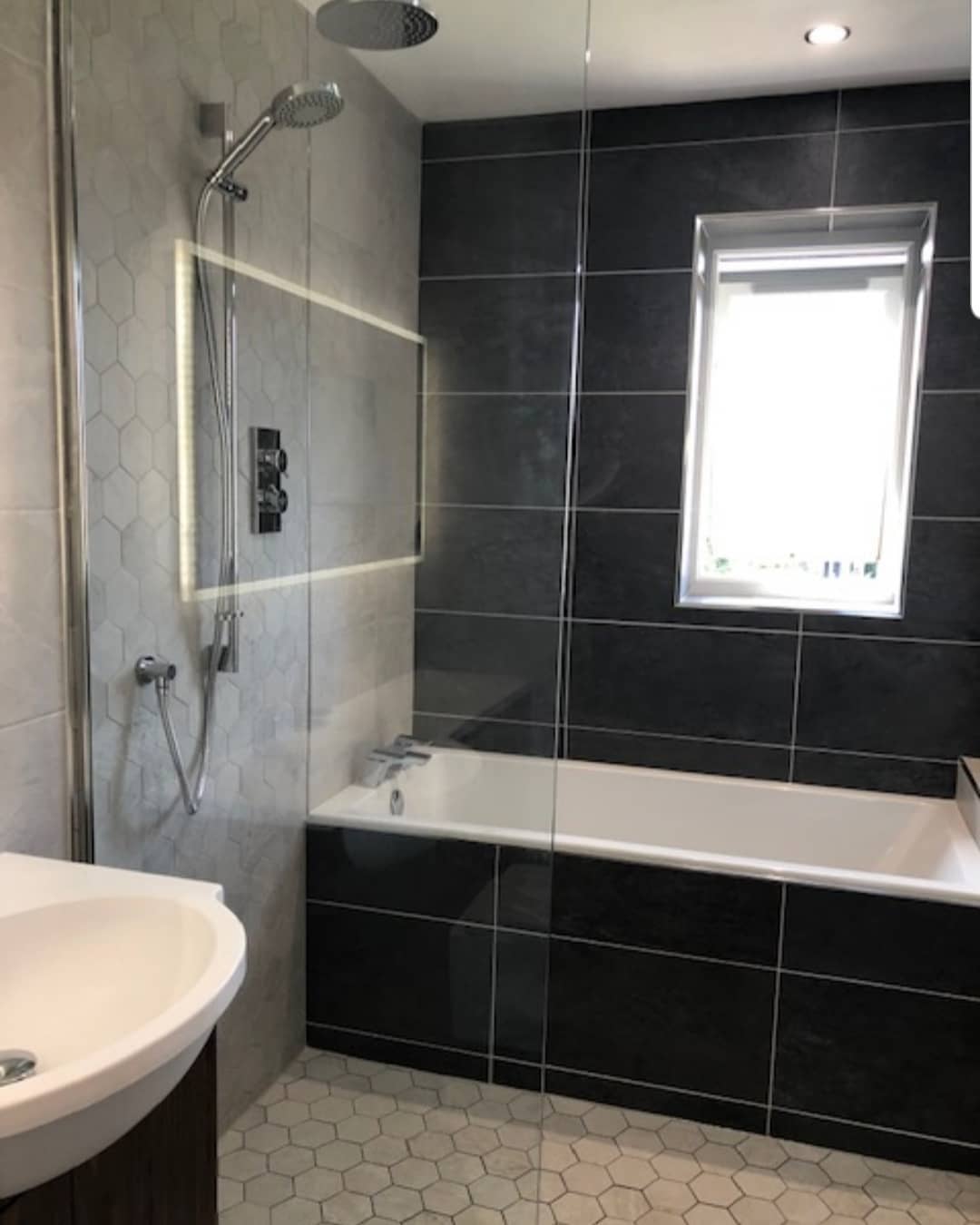 Grey Bathroom with shower and bath