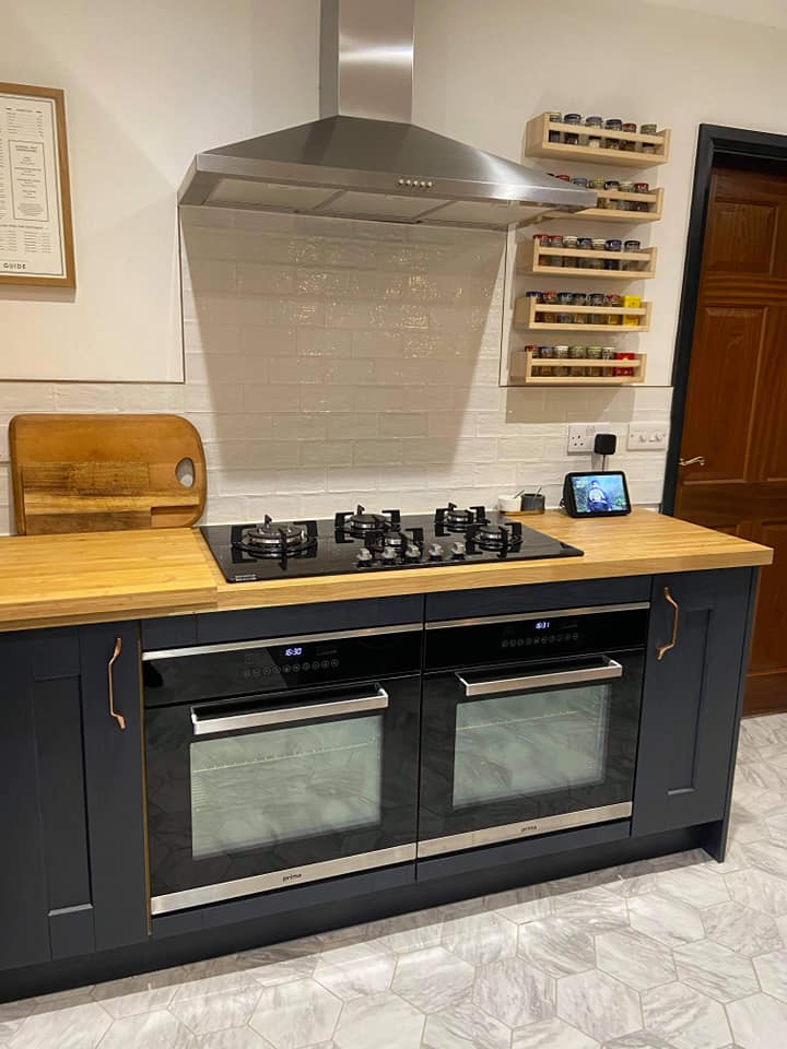 Indigo Kitchen with natural wood accents