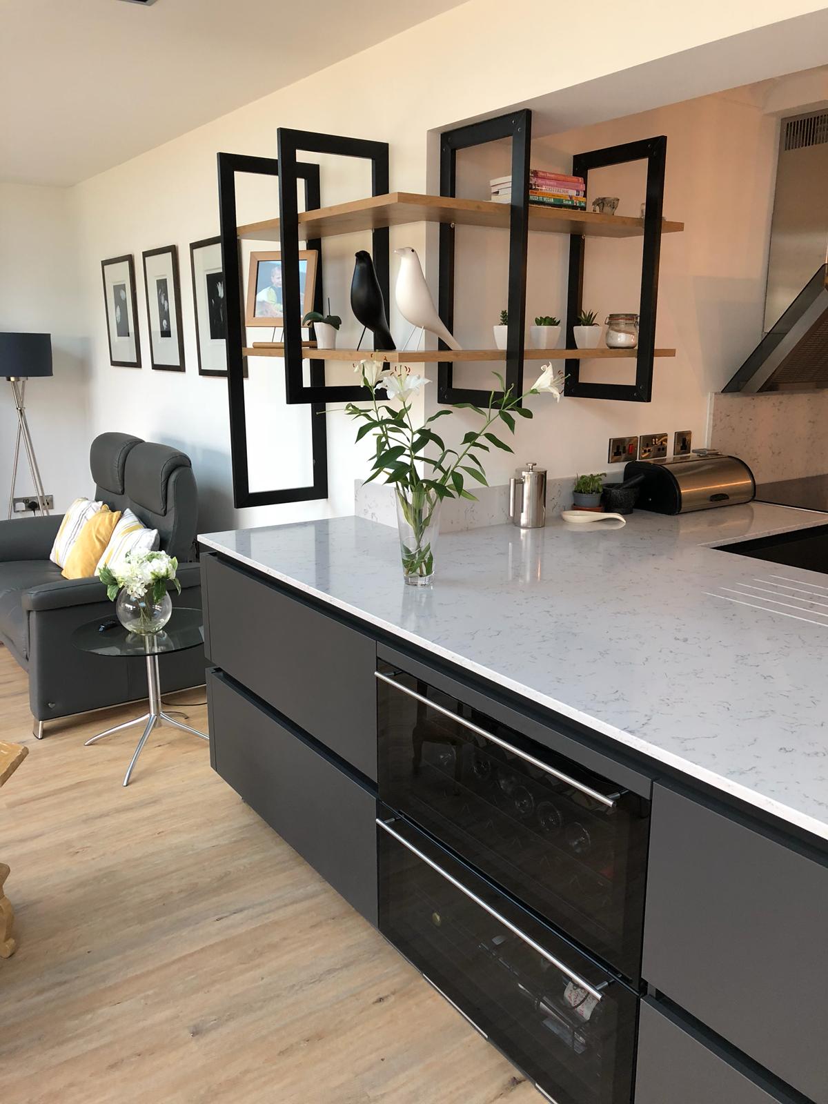 Modern sleek black kitchen design