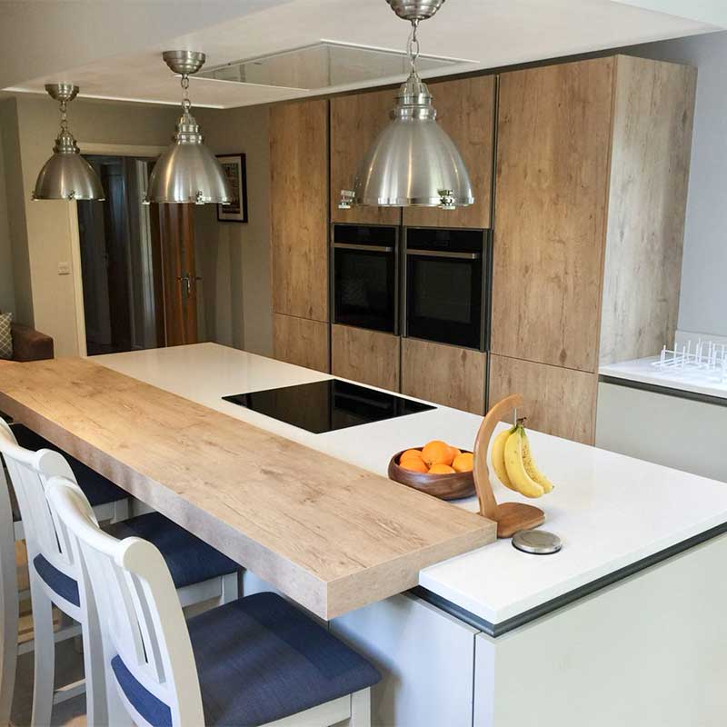 white quarts and wood worktops-rotpunkt-oak-kitchen-design-