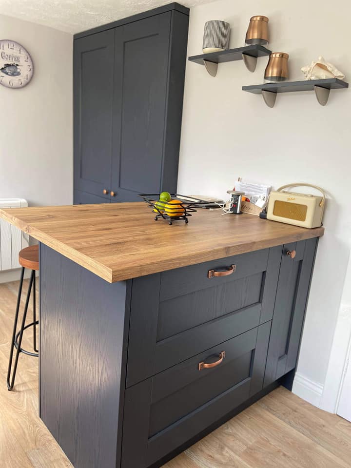 Symphony Indigo Ashbourne Kitchen with Blanco Sink and Chalet Oak Laminate worktops