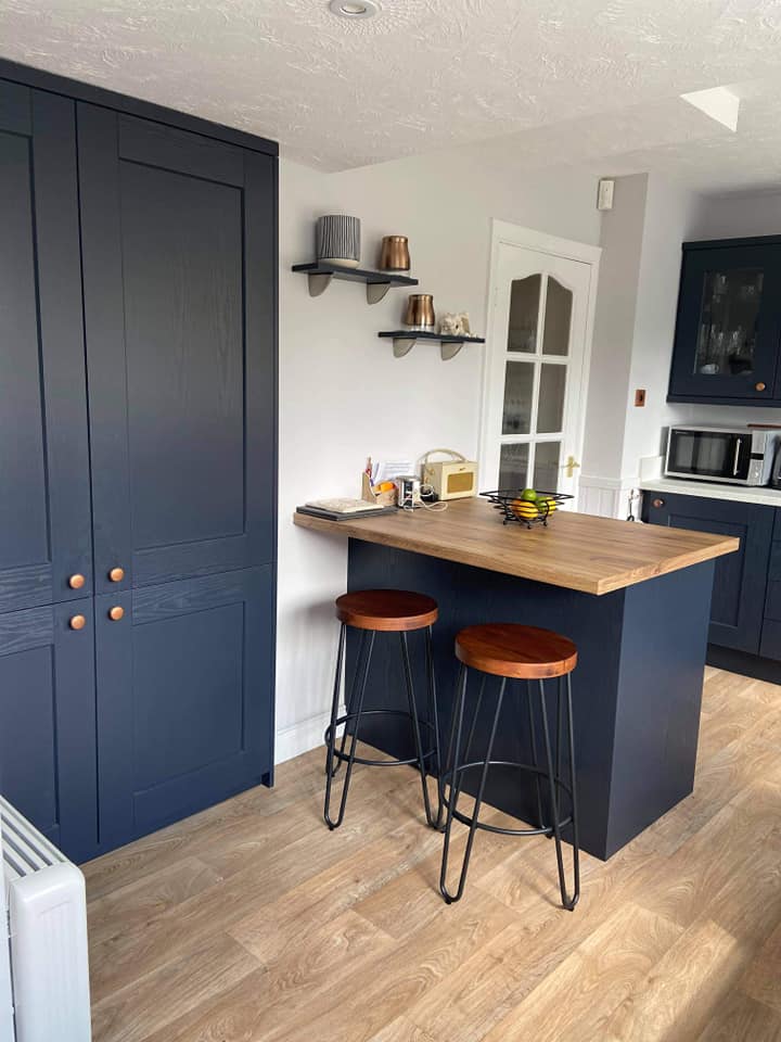 Symphony Indigo kitchen with copper fixings.