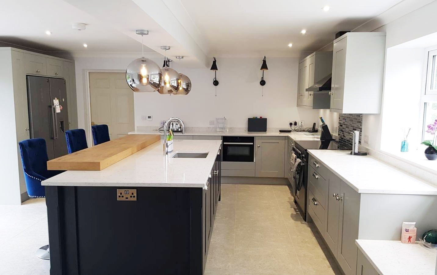 Two tone traditional shaker kitchen with modern accents