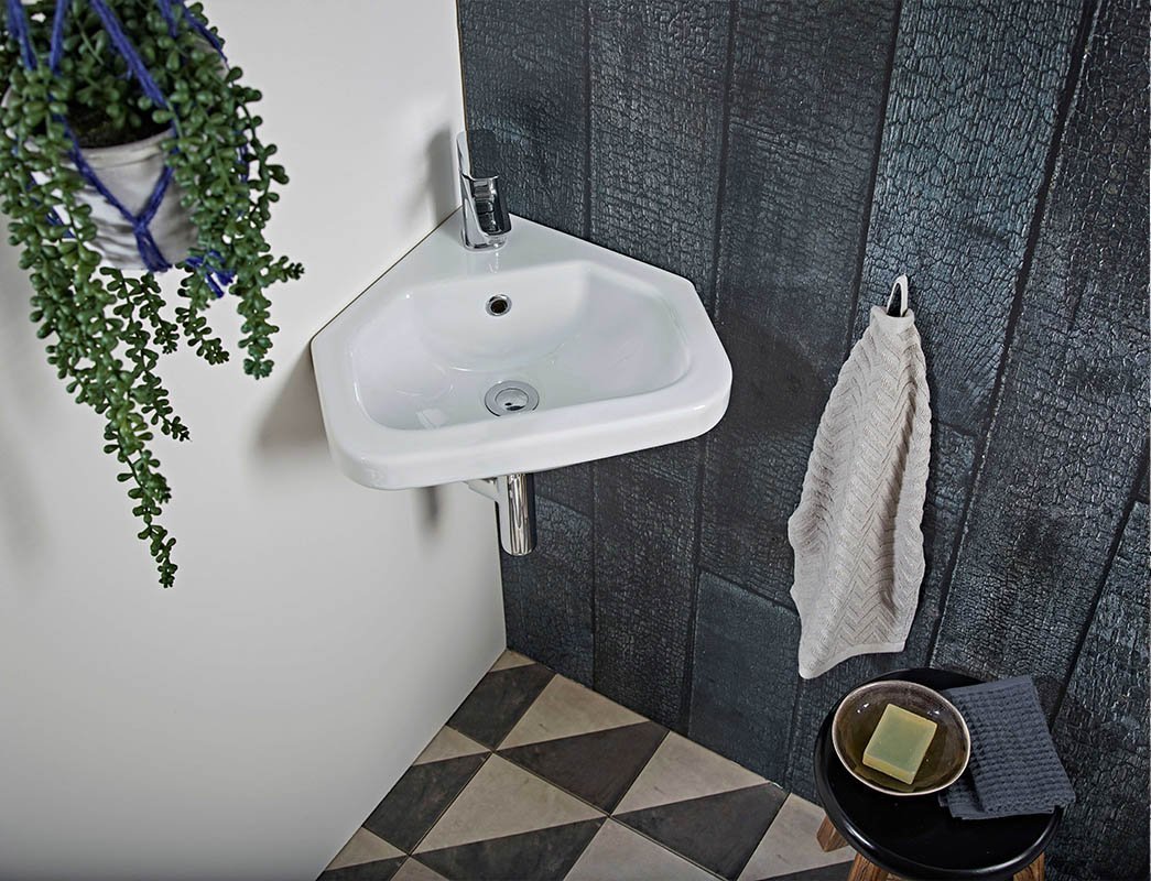 Corner sinks are a great idea for small bathrooms