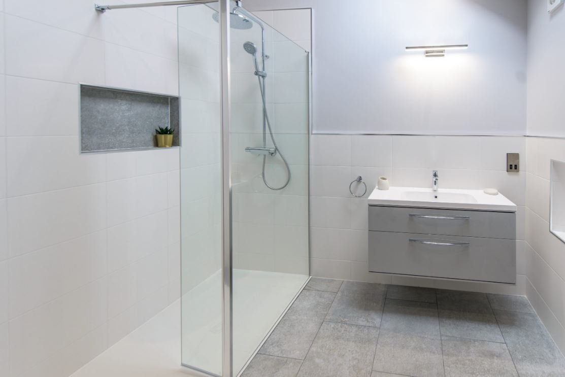 Light and neutral colours create a bright modern bathroom in this small space in a Barn Conversion in Owmby Lincolnshire