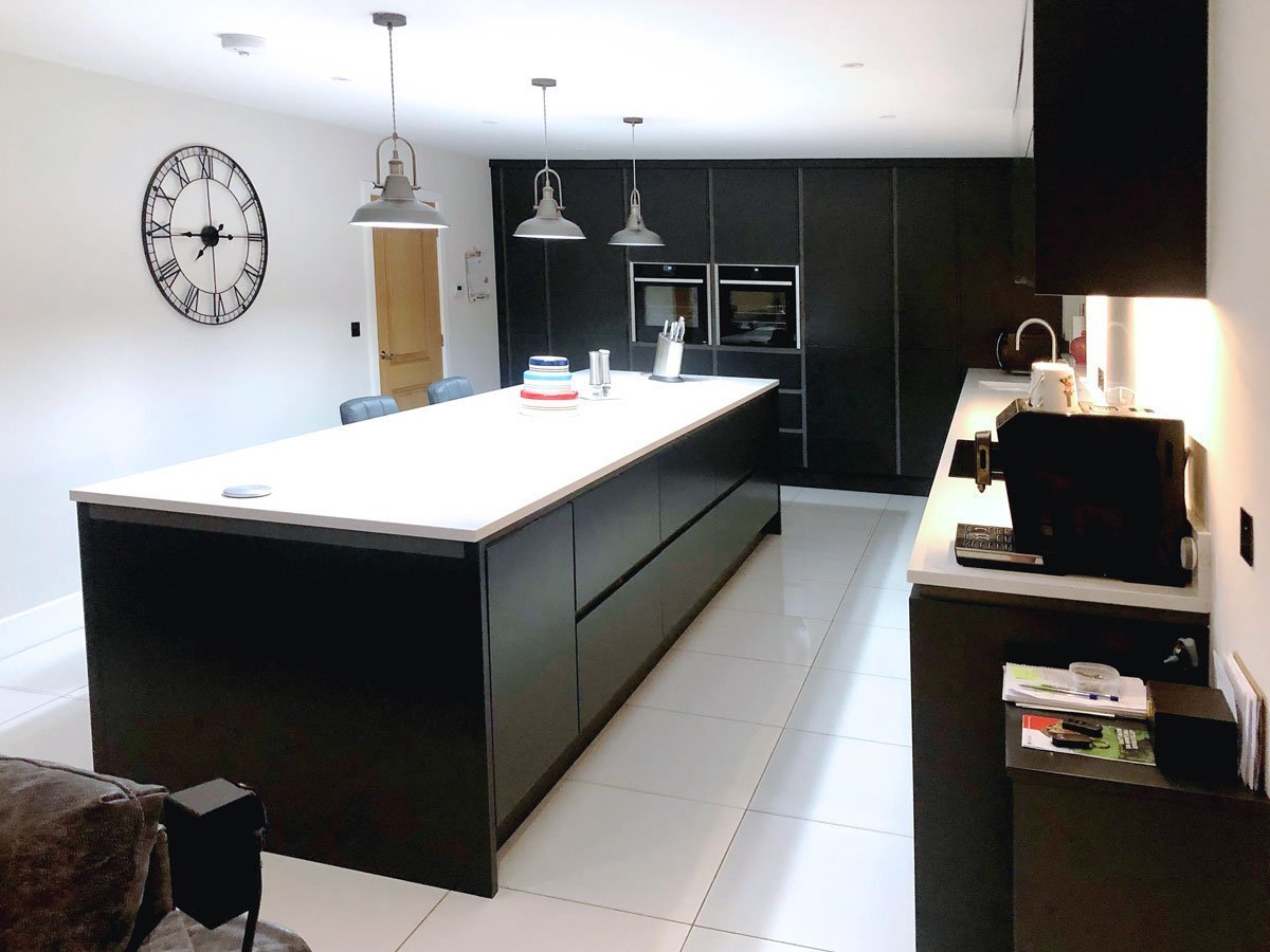 navigate to https://www.turnbull.co.uk/showrooms/case-studies/kitchens/black-kitchen-bespoke-design/