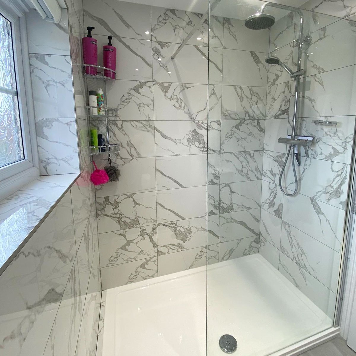 Marble effect tiles in Shower enclosure