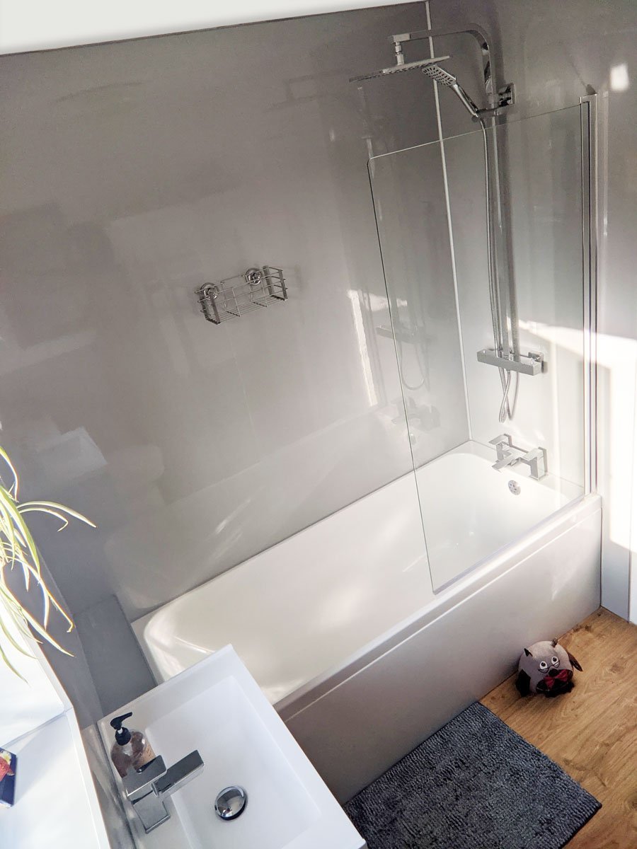 Standard bath with shower for modern grey bathroom