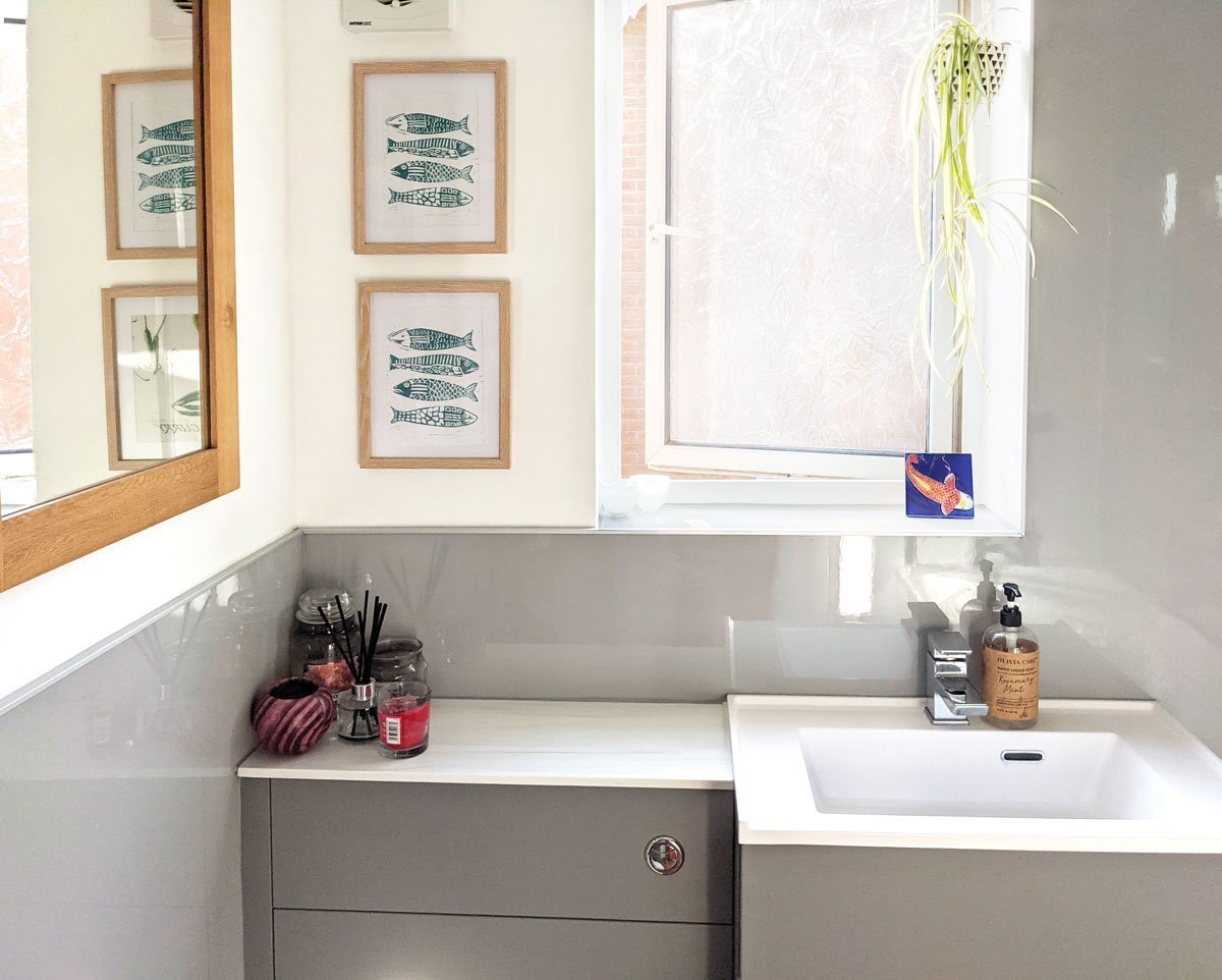 Small Grey Bathroom with large mirror