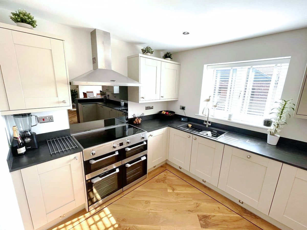 Large double oven and painted shaker kitchen cabinets from symphony kitchens