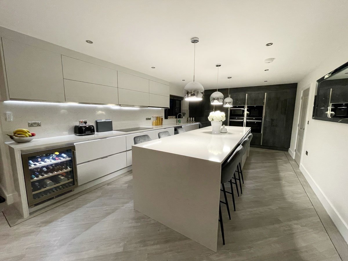 Waterfall white quartz kitchen island