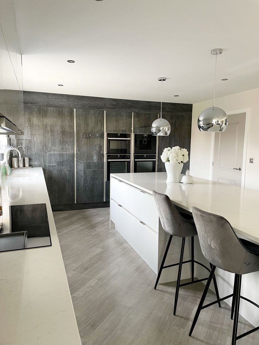 navigate to https://www.turnbull.co.uk/showrooms/case-studies/kitchens/sheraton-kitchen-grey-gloss/