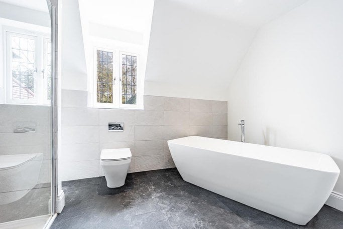 Bright Modern Bathroom with freestanding bathtub