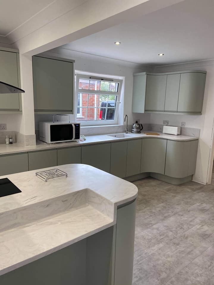 Curved Pale Green Kitchen