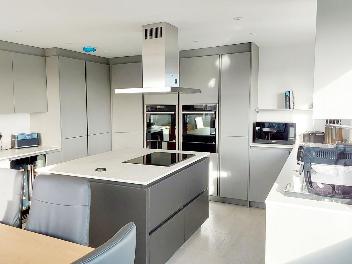 Island in grey fitted kitchen