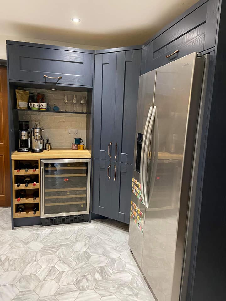 Navy Blue Kitchen with Clever Appliances - integrated Wine Rack and Wine Cooler