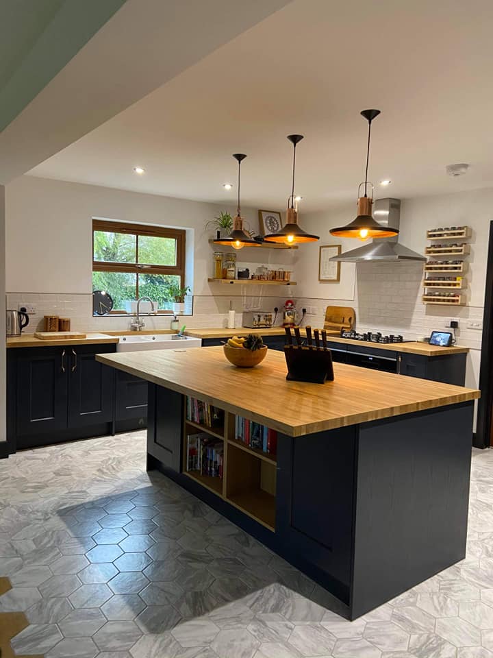 Navy Blue Kitchen with Kitchen Island and Pendant Lighting