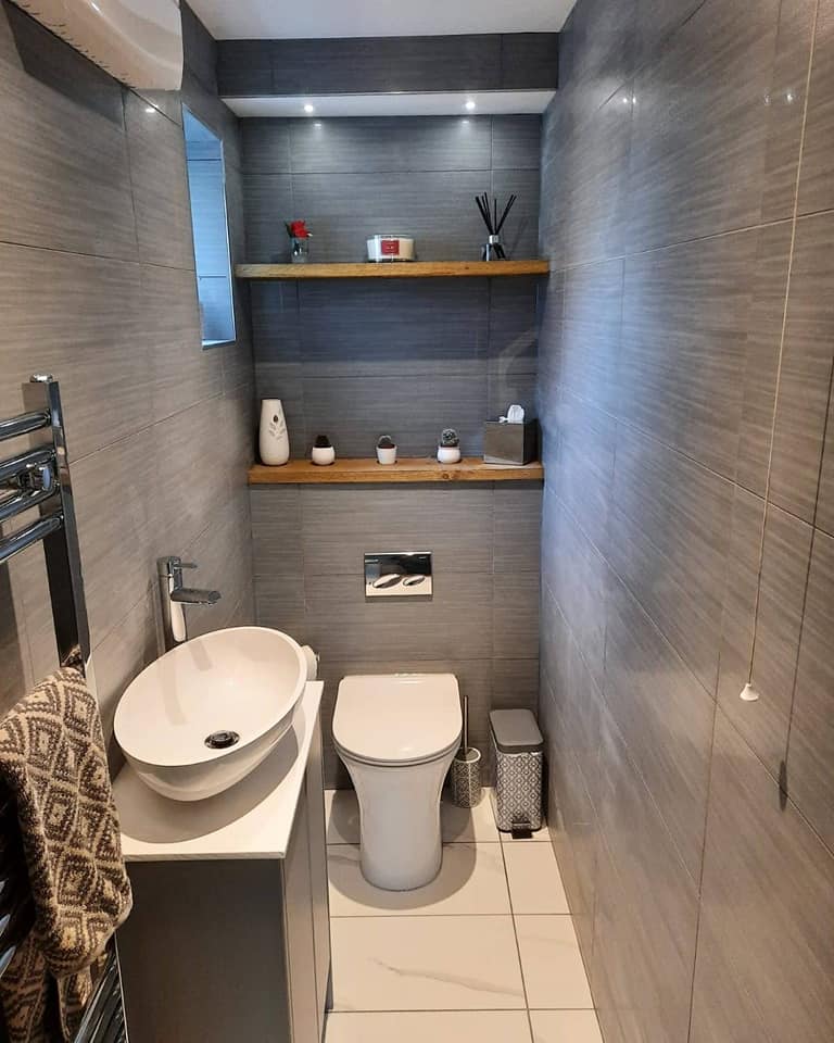 Small cloakroom with WC and in build shelving