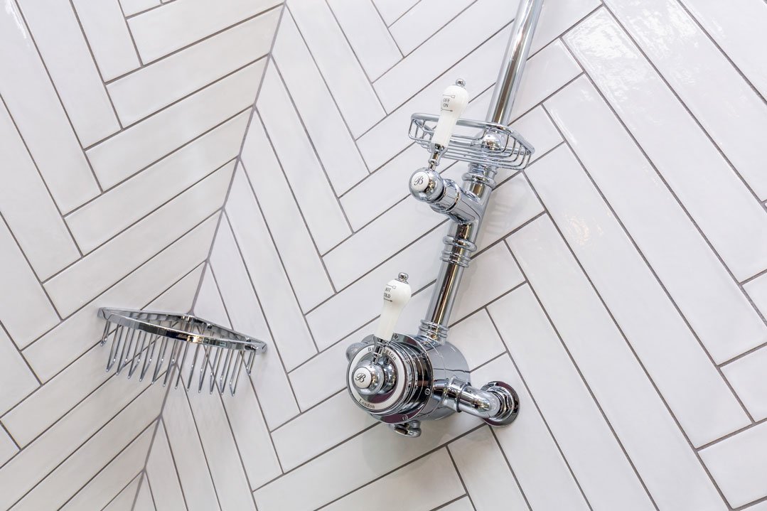 Herringbone laying pattern for long Bathroom Tiles