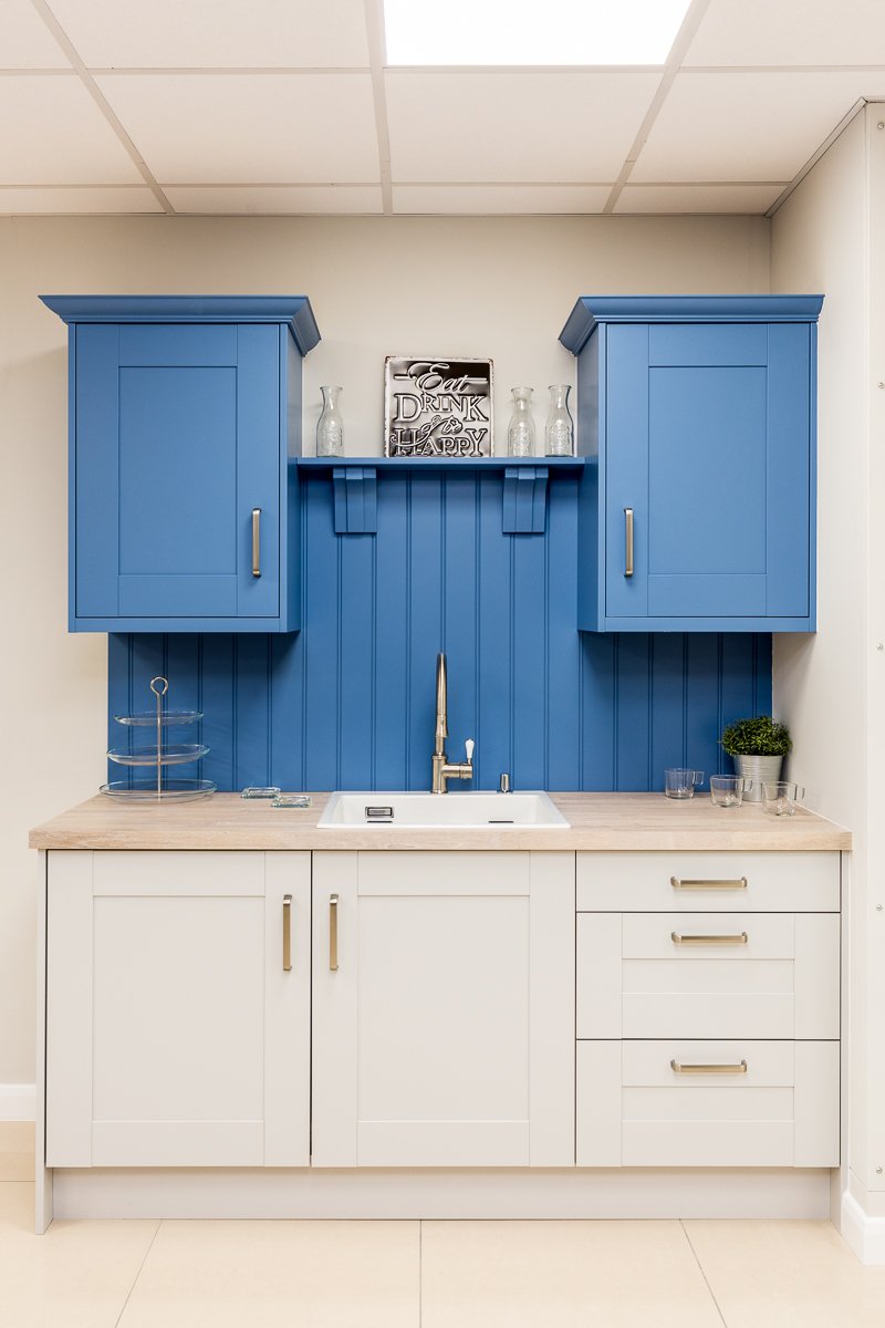 Small Kitchen in Indigo with two tone cream lower cabinets
