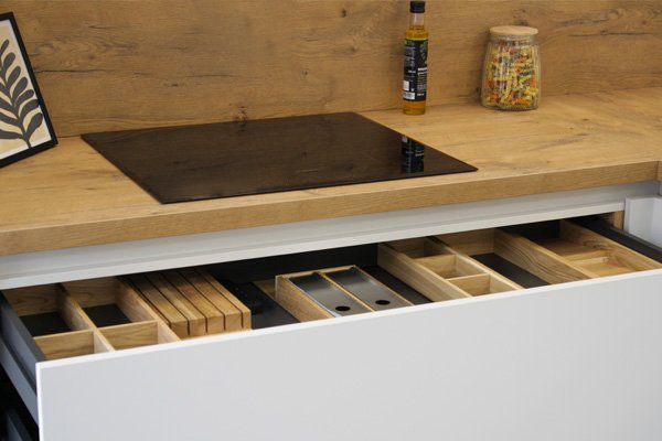 Drawer organisers in the Rotpunkt kitchen cabinet range