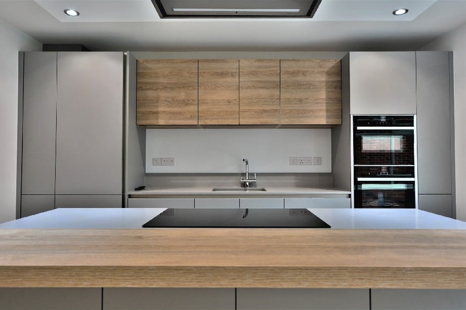Sleek handleless Grey Kitchen with modern NEFF appliances
