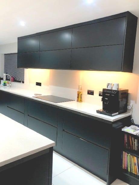 black kitchen cabinets with under cabinet lighting