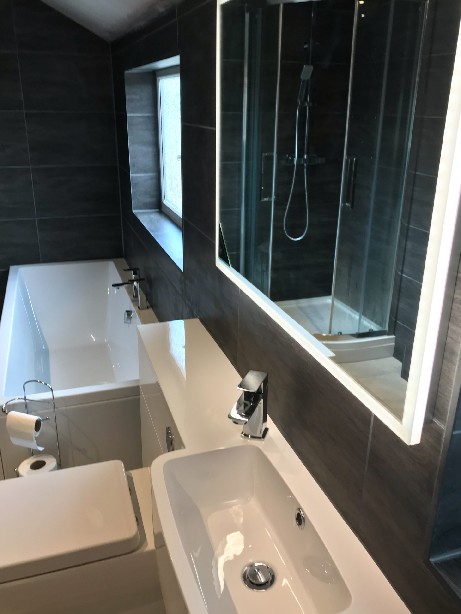 Illuminated HIB Mirror brightens up a dark Bathroom
