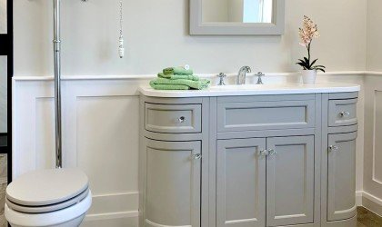 Burlington high level cistern bathroom with traditional vanity unit