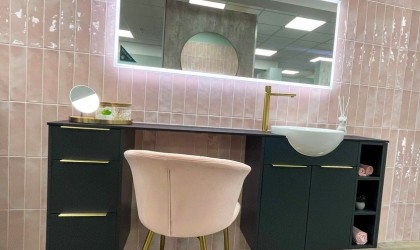 A pink powder room designed by Turnbull.